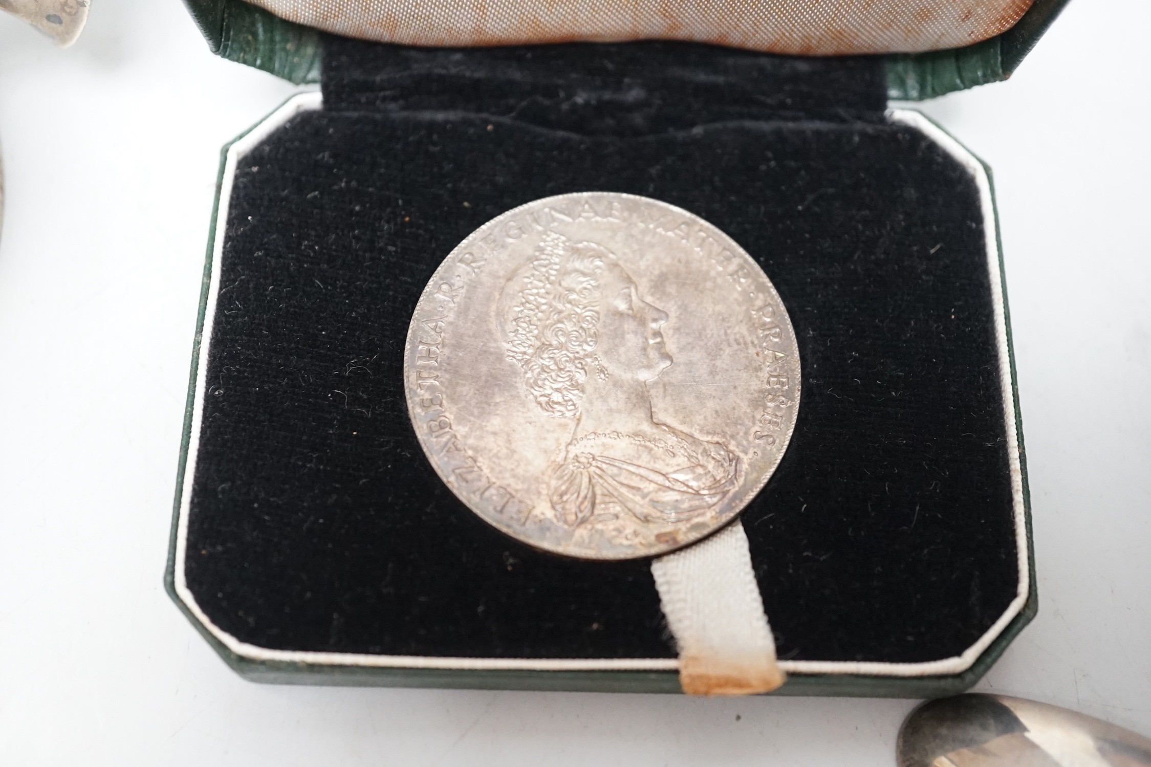 A George VI silver mug, with engraved inscription, James Dixon and Sons, Sheffield, 1943, 11.3cm, together with twelve items of silver flatware including set of six William IV silver fiddle pattern teaspoons, a silver al
